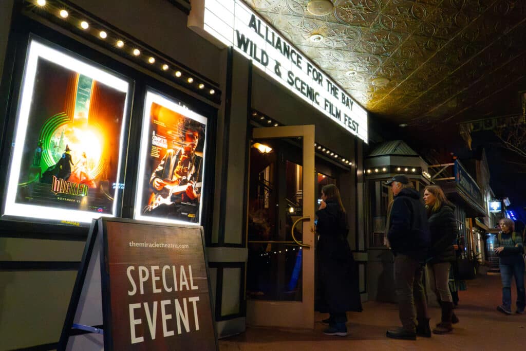 Movie marquee sign outside The Miracle Theater in DC that reads, "Alliance for the Chesapeake Bay Wild & Scenic Film Festival."