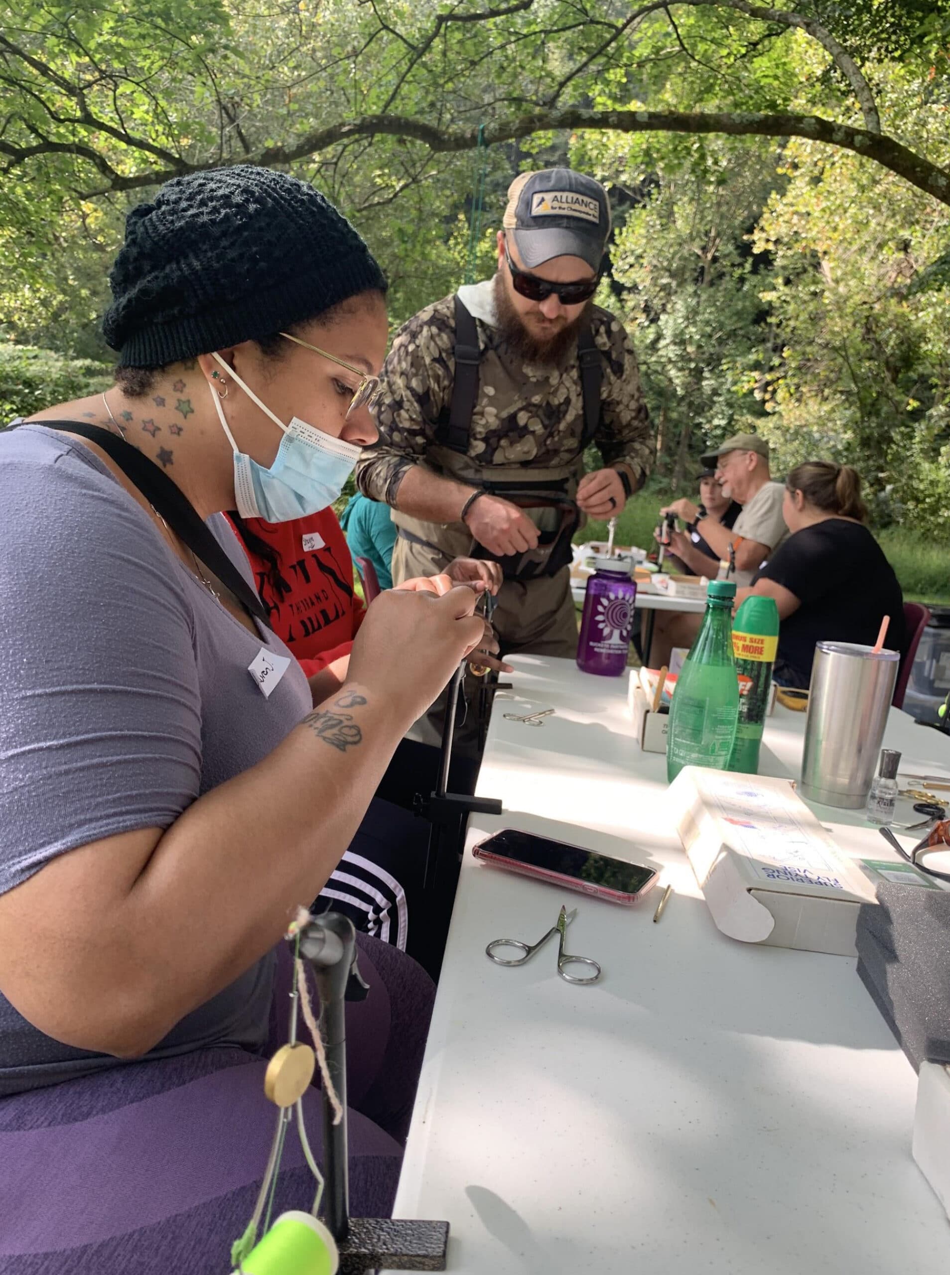 Finding Your Outside! Volunteer instructors from the Board of the Muddy Creek Trout Unlimited Chapter demonstrated how to tie a few flies.