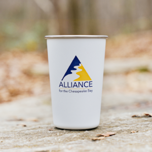 Alliance for the Chesapeake Bay logo on a white klean kanteen pint cup.