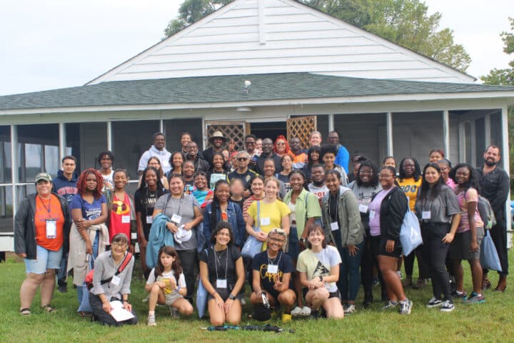 A large group of people posing for a group photo.