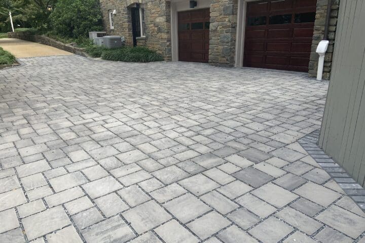 Gray permeable paver driveway outside of a DC home.