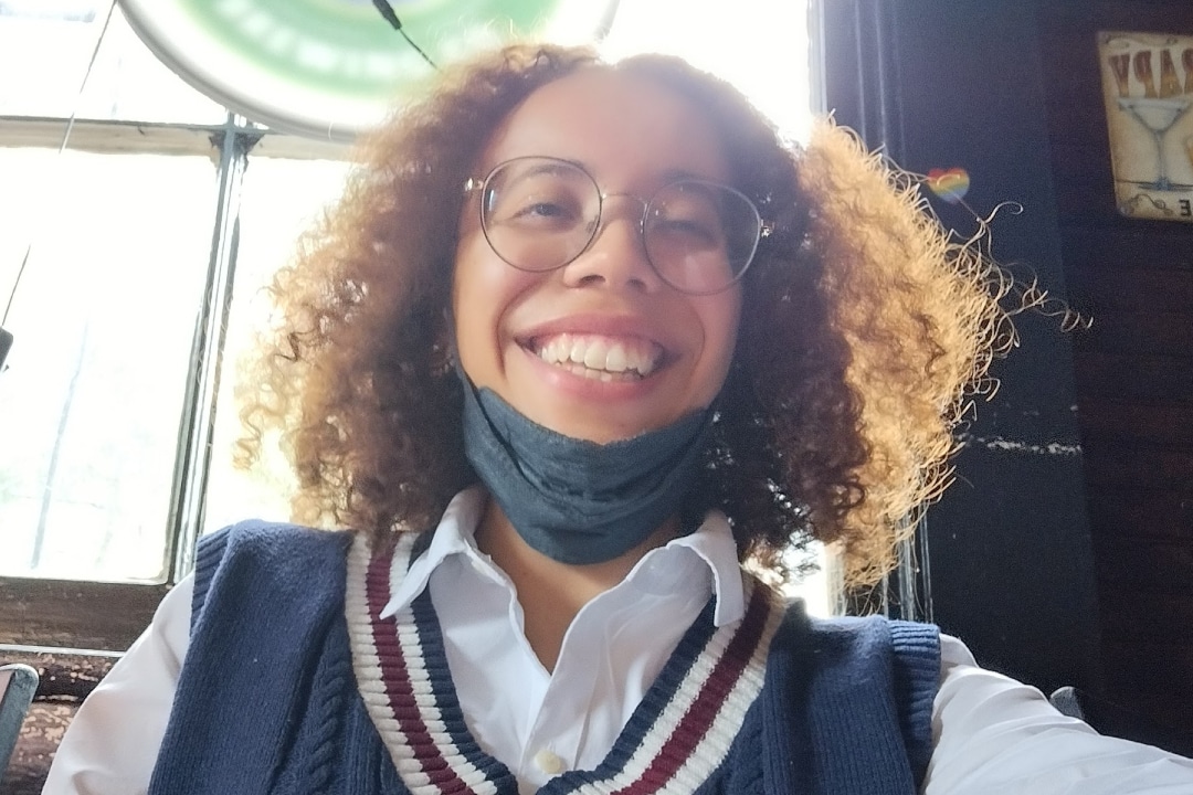 A person smiling for a selfie