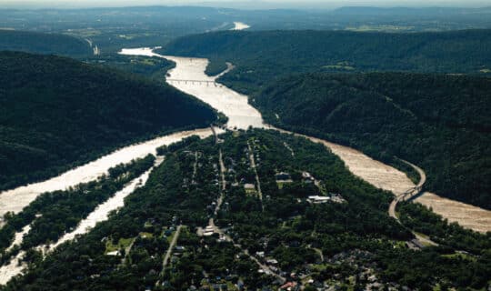 an aerial view of two rivers meeting