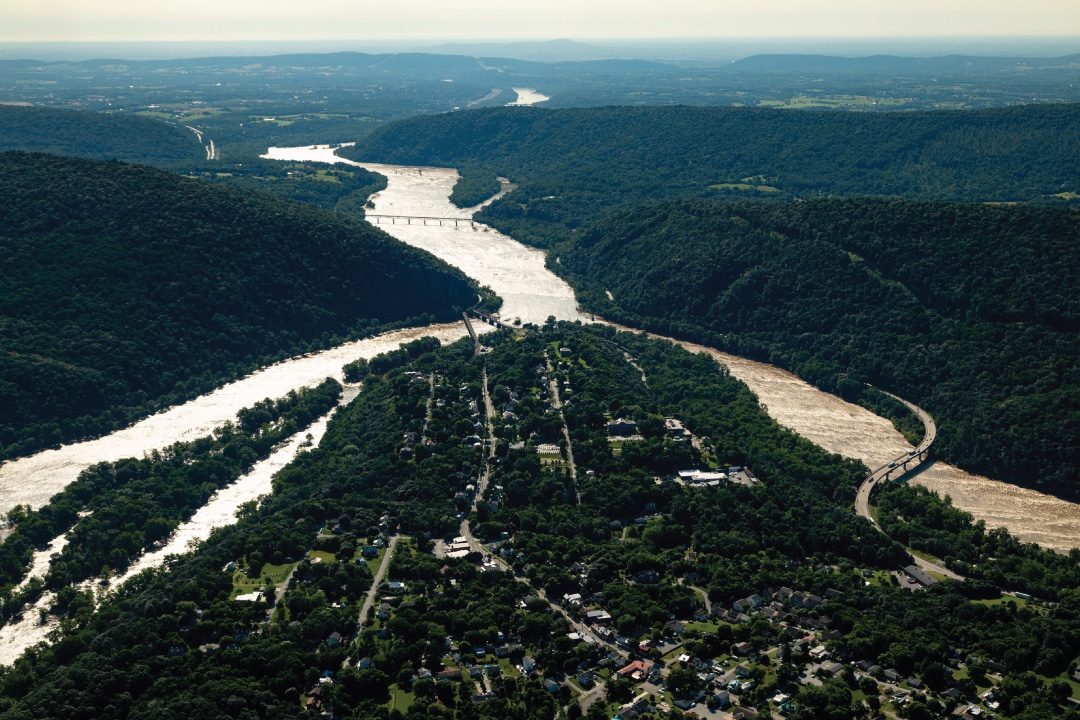 an aerial view of two rivers meeting