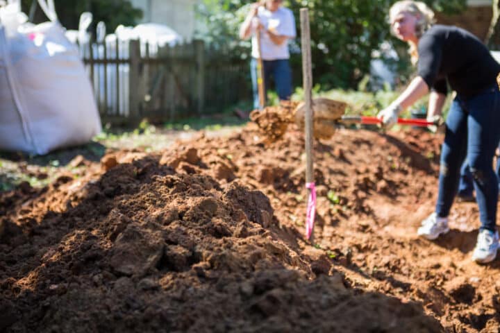 a shovel sitting in soil
